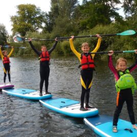 Kids paddleboarding
